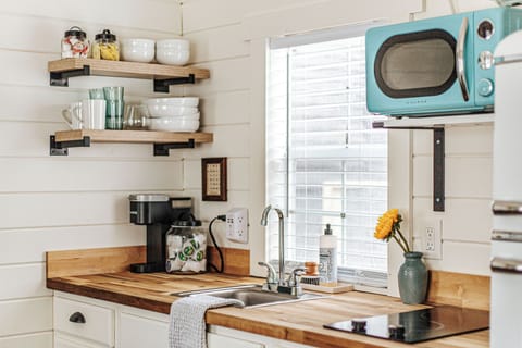 Perfect kitchen has everything you need including full size microwave, fridge