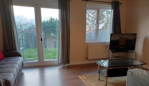 Business House | Living area | 55-inch Smart TV with digital channels, Netflix, streaming services