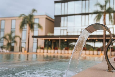 Outdoor pool, pool umbrellas, sun loungers