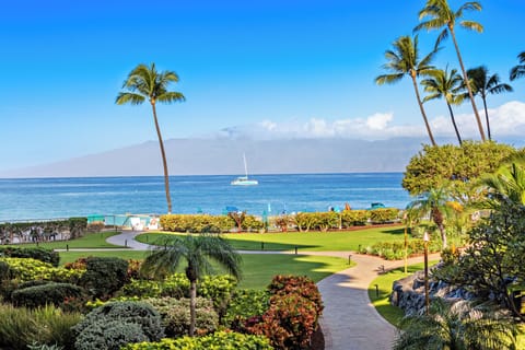 Indulge in serene poolside moments with picturesque views of Kā‘anapali Beach, where ocean blues and tropical beauty create an unforgettable backdrop.