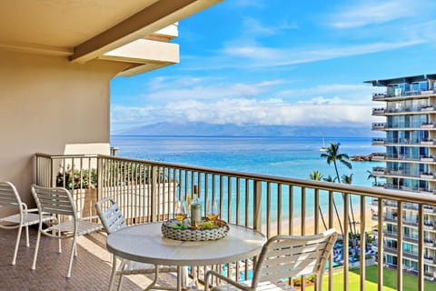 Oceanview balcony dining with sweeping blue views, gentle breezes, and a front-row seat to paradise.