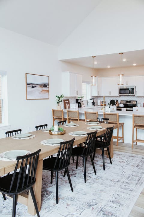 Dining table that seats up to 12 people and 6 people at the bar