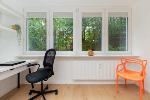 The kitchen's contemporary decor creates a welcoming atmosphere.