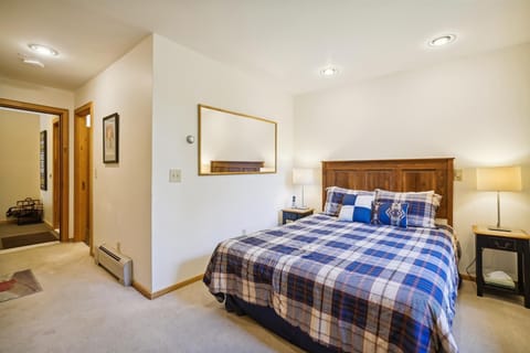 Queen sized bed, access to small deck.  Small amenities for your convenience, coffee pot and TV