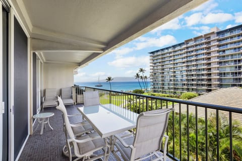 Dine al fresco on your private balcony with sweeping ocean views, swaying palms, and refreshing island breezes—your perfect Hawaiian morning coffee spot awaits.