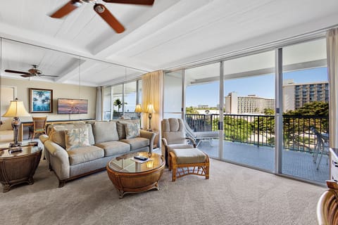 Settle into your coastal-inspired living room where you can unwind with garden views from your private balcony. Light, airy spaces invite you to relax in comfort and style after a day exploring the island.