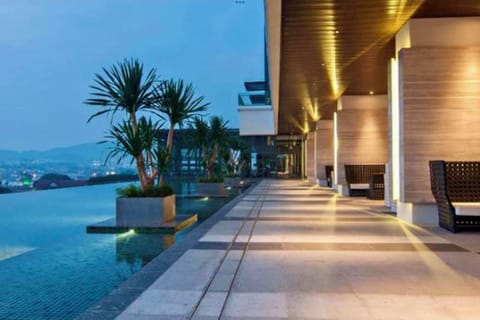 2 outdoor pools, open 7:00 AM to 10:00 PM, pool umbrellas, sun loungers