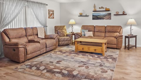 Spacious living room with open design to kitchen area