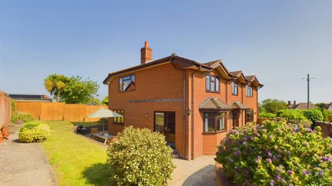 A large, red-brick family holiday home perfectly situated for a coastal escape in Totland Bay.