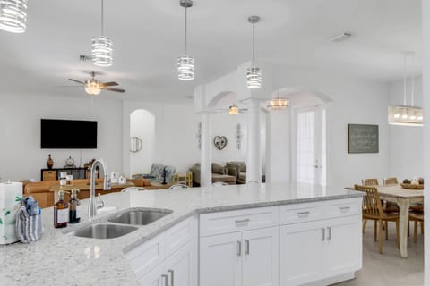 The beautiful remodeled kitchen is at the heart of the home; it's fully equipped with full size refridgerator/freezer, oven, dishwasher and microwave.