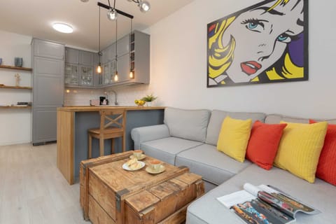 Enjoy your favorite shows on the flat-screen television in the elegant living area.