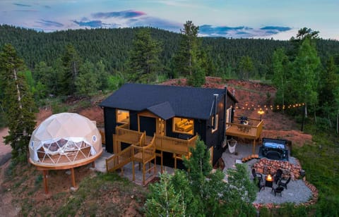 Geo Dome Movie Theater & Yoga Studio with Hot Tub, Fire Table, Fireplaces, Outdoor Dining, Grilling, 3 Bedrooms, Work Desk, 2 Living rooms and more to enjoy.