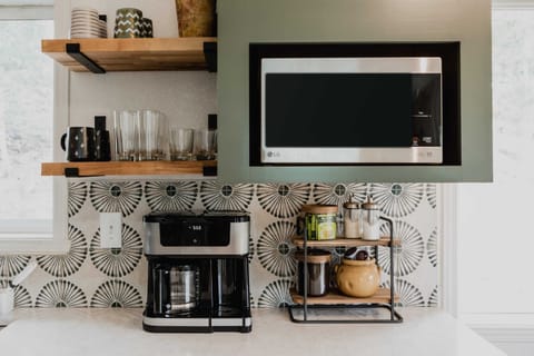 Coffee bar includes dark coffe grounds, pods, sugar, creamer, tea and filters. Brew a pot or just a cup!