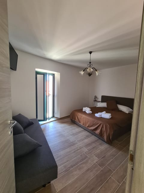 Family Quadruple Room, 1 Double Bed with Sofa bed | Desk, free WiFi, bed sheets