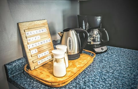 drip style coffee maker with coffee supplied and hot water kettle