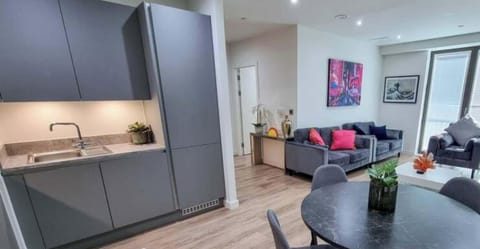 Spacious open-plan living area, perfect for relaxing, cooking and entertaining during your stay