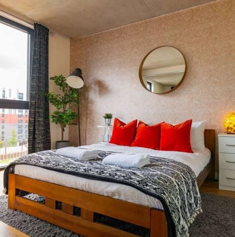 Super king bed with hotel-quality linen and canal views