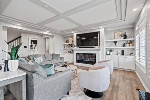 Living Room - Smart TV, Sound Bar, Fireplace, and Comfortable Seating