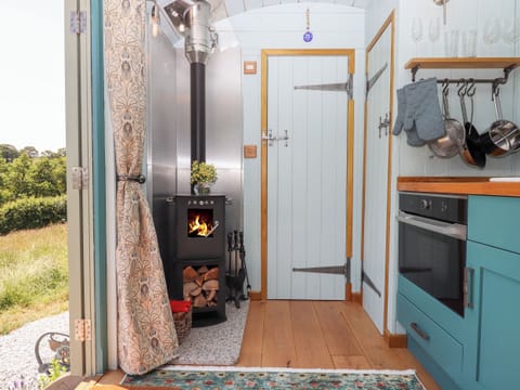 Fridge, electric kettle, toaster, cookware/dishes/utensils