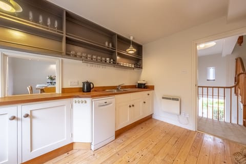 First floor: The kitchen is well-equipped