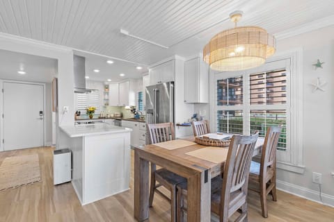 Dining table has seating for four