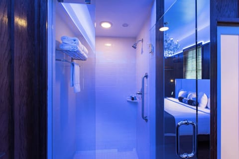 Designer toiletries, hair dryer, bathrobes, towels