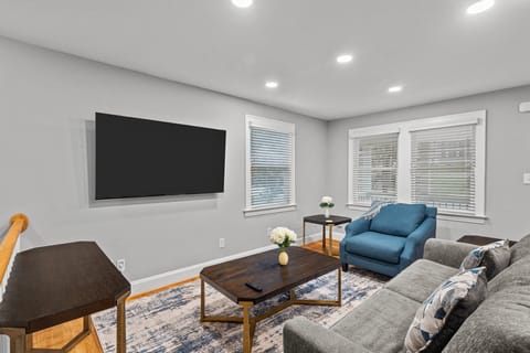 Living room with Smart TV and a Full Sleeper Sofa