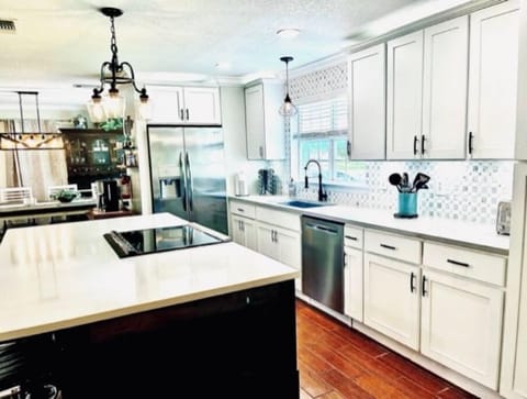 Brand new kitchen includes air fryer oven, cooktop, microwave in the island…