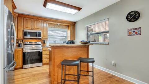 Nestled in a cozy corner, you'll find a charming breakfast table for two. 