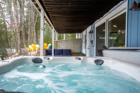 Relax in the hot tub while snowflakes fall—a winter experience like no other.