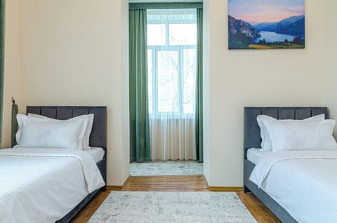 Twin Room | Blackout drapes, iron/ironing board, free WiFi
