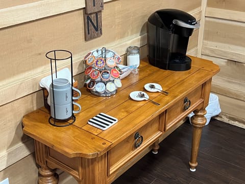 Free K Cups and condiments at Coffee bar.