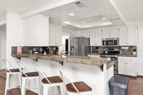 Semi-side view of kitchen