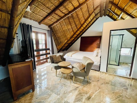 Luxury Double Room | Living area | 50-inch Smart TV with digital channels, Netflix, pay movies