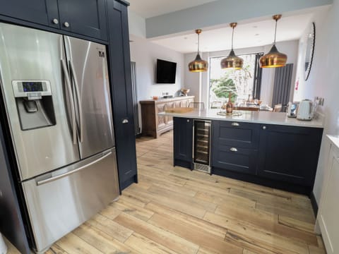 Fridge, dishwasher, electric kettle, cookware/dishes/utensils