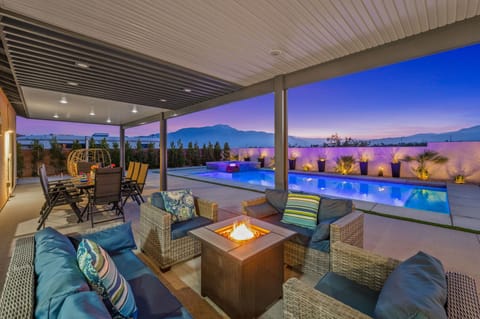 Relax in our lounge seating area with fire pit and beautiful sunset views.