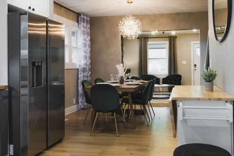 An open-concept kitchen and dining space, perfect for gathering and enjoying meals together.