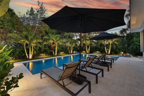 Experience tropical vibes with the swaying palms surrounding our incredible pool, or unwind and relax on our cozy loungers.