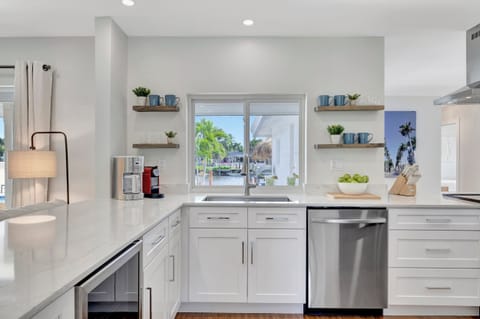 Immerse yourself in the luxury of cooking with our fully equipped kitchen, boasting spacious countertops, modern appliances, and a generous fridge—your gateway to gourmet experiences awaits.