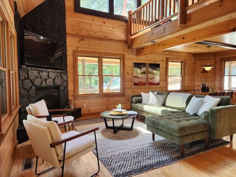 You`ll love the Year-Round Mountain Views from the green velvet sofa