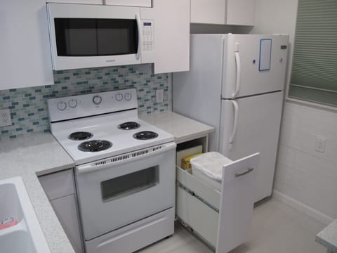 Standard Suite, 1 King Bed | Private kitchen | Full-size fridge, microwave, stovetop, dishwasher