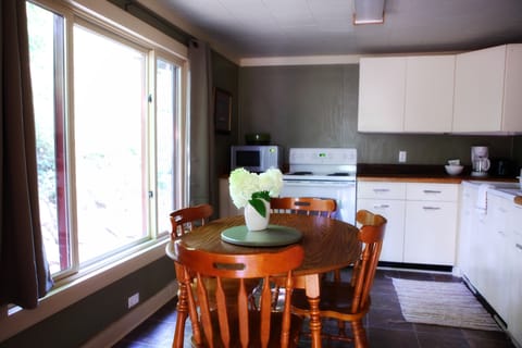 Cottage Eleven | Private kitchen | Full-size fridge, microwave, oven, stovetop