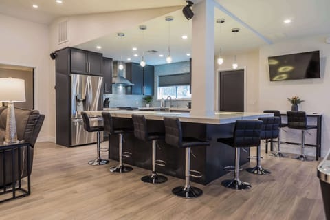 Gorgeous, open, large stocked kitchen with stainless steel appliances