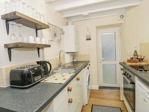 Fridge, electric kettle, toaster, cookware/dishes/utensils