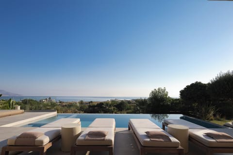 Villa Skianos, an exquisite villa located in the lively area of Dramia, offering an idyllic escape just 500 meters on foot from a long sandy beach.