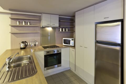 One Bedroom Apartment City View | Private kitchen | Microwave, stovetop, dishwasher, coffee/tea maker