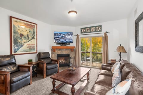 Vacation Rentals in Park City at Bear Hollow Lodges 1304: Living room with gas fireplace