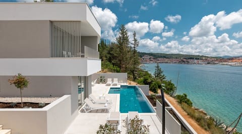 Exterior of Canzona di Mare 1 luxury Croatian vacation rental villa with private infinity pool next to the beach