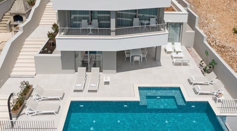 Exterior of Canzona di Mare 1 luxury Croatian vacation rental villa with private infinity pool next to the beach