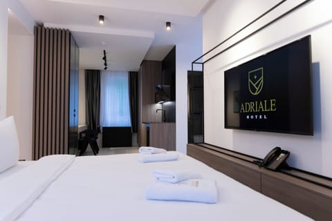 Deluxe Studio | Premium bedding, down comforters, memory foam beds, minibar